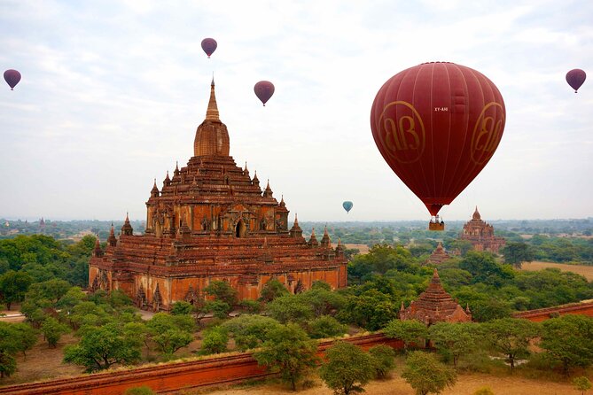 Float on a hot air balloon over stupa-filled Bagan