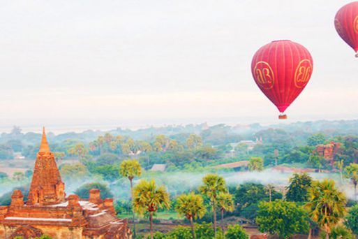 Float on a hot air balloon over stupa-filled Bagan
